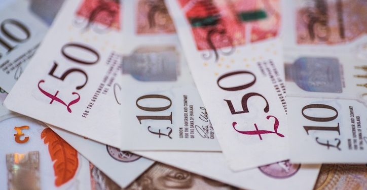 The Pound almost flat against both the Dollar and the Euro