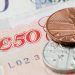 Pound gain ground against Dollar and Euro during early Friday trading
