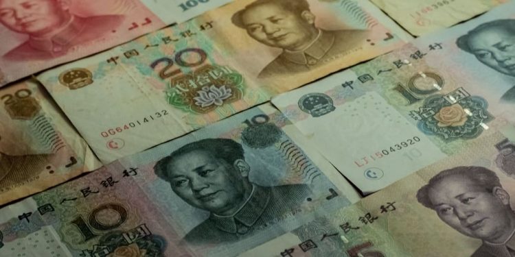 Yuan rose as Chinese central bank set official exchange rate at the highest level since 2005