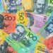 Aussie touches three-year trading highs