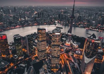 Asian bourses trade indirectly following flat performance of US peers