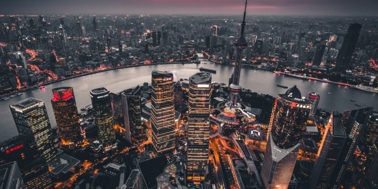 Asian bourses trade indirectly following flat performance of US peers